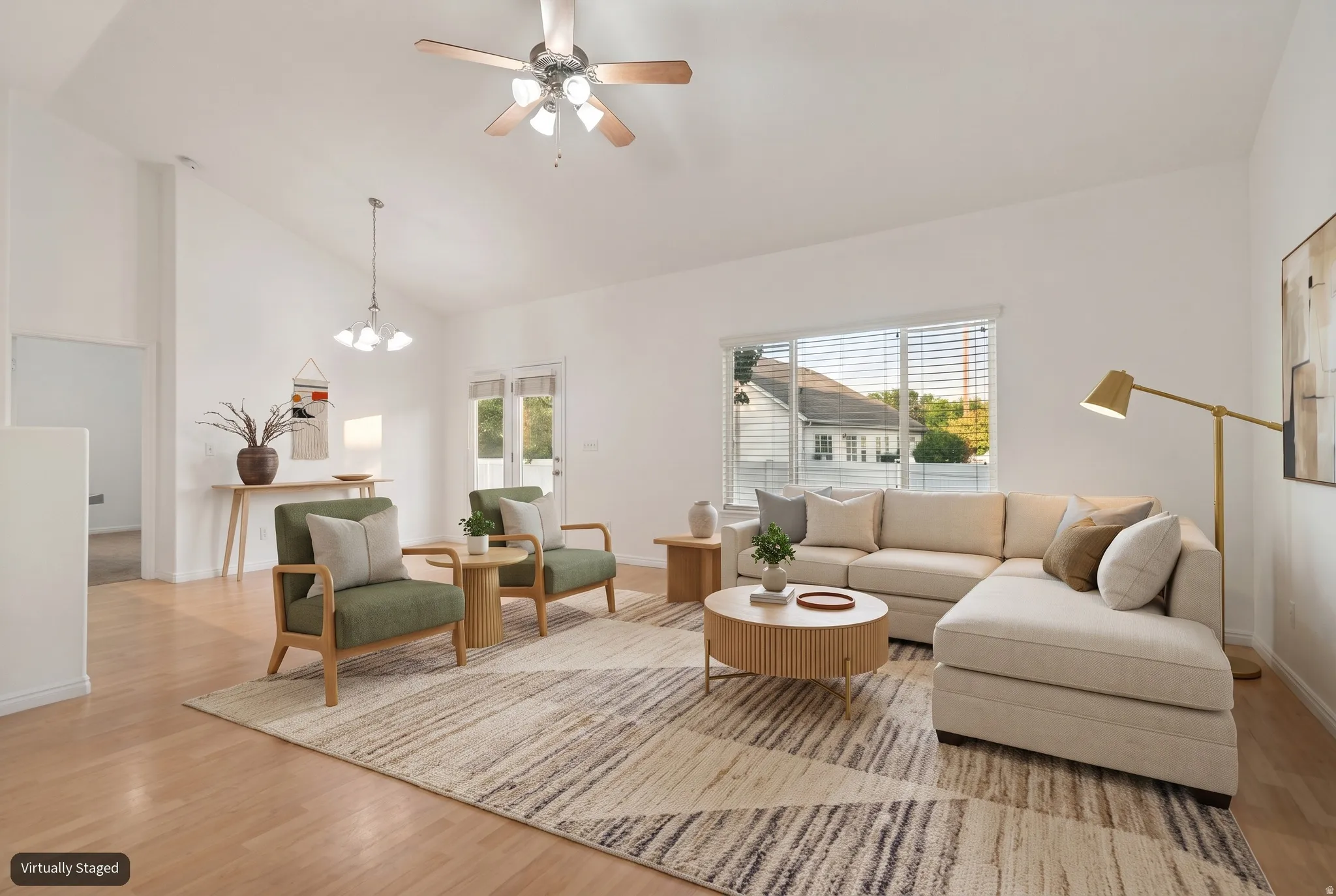 Bright living space with mountain views (virtually staged)
