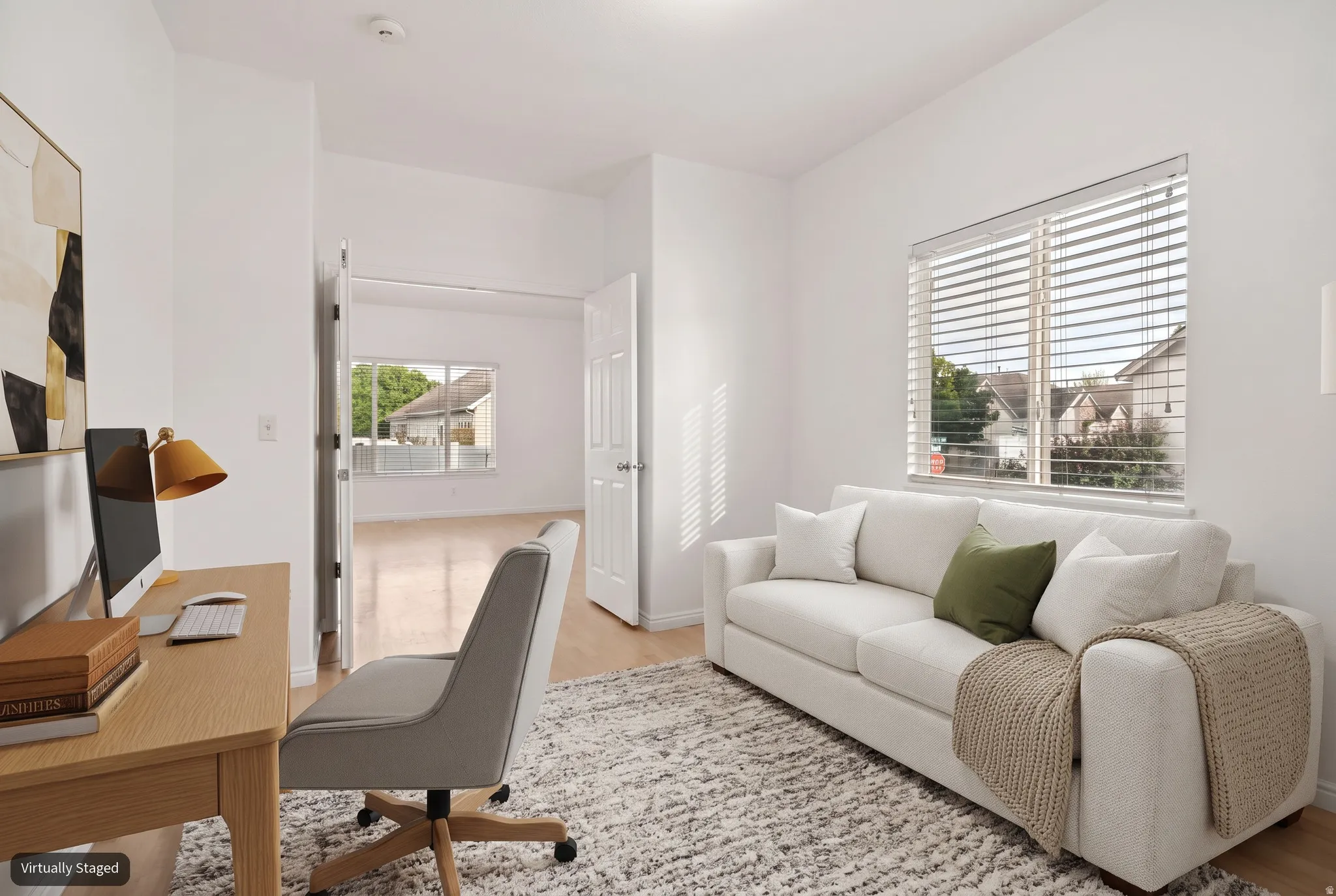 Main floor flex room (virtually staged as an office)
