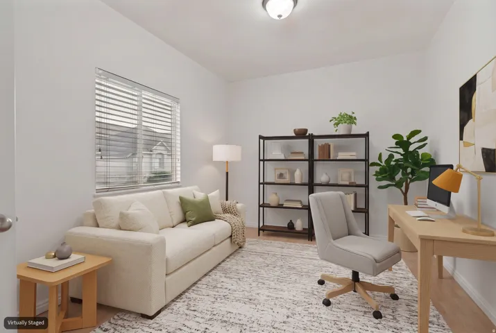 Main floor flex room (virtually staged as an office)