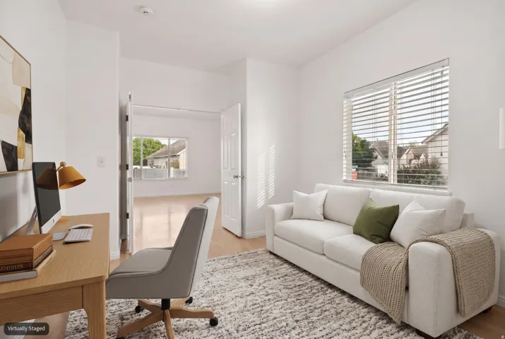 Main floor flex room (virtually staged as an office)