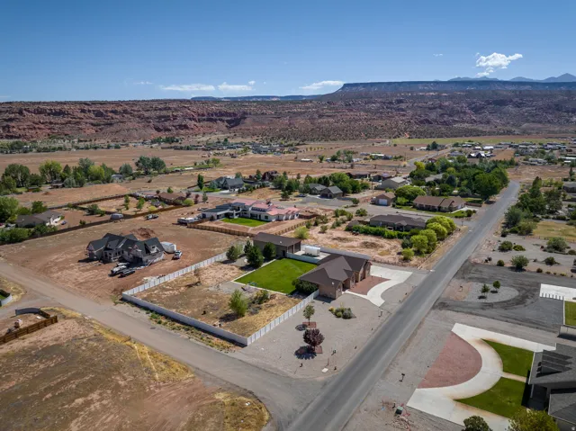 Expansive residential area with diverse architectural styles, featuring established homes and new construction