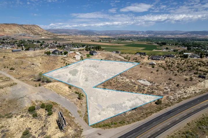 Expansive undeveloped land parcel with marked boundaries