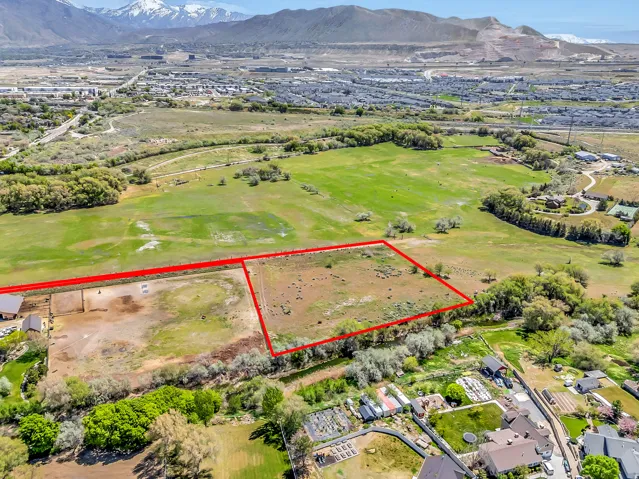 Aerial perspective showcasing expansive acreage with natural vegetation