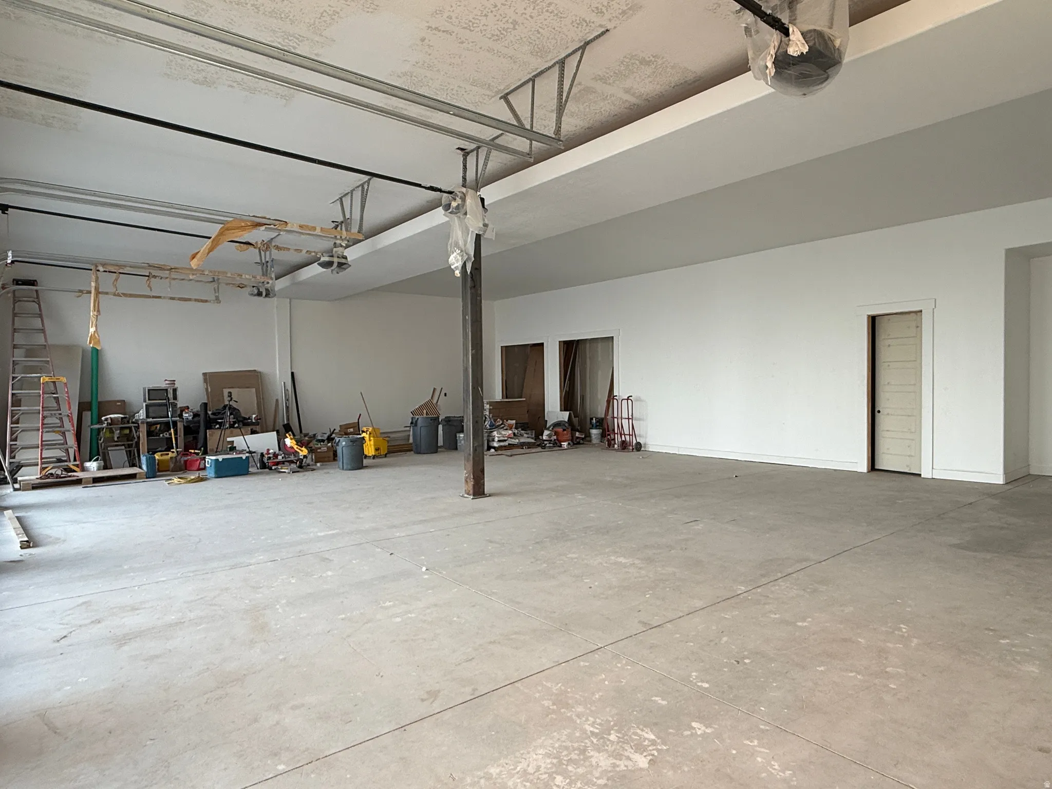 Expansive concrete flooring and high ceilings with exposed structural elements