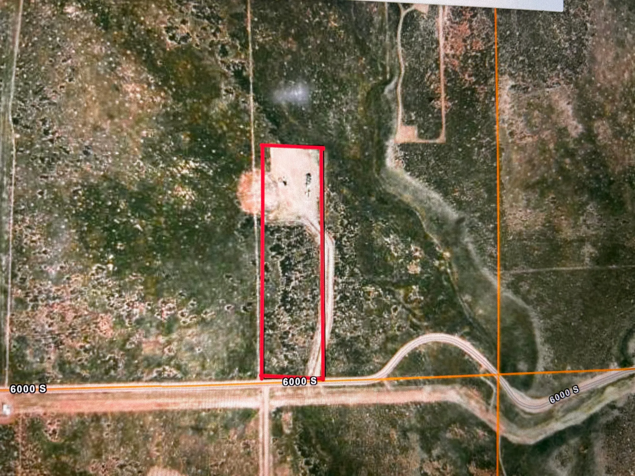 Aerial Survey. Depicting the property’s boundaries and surrounding geographical features