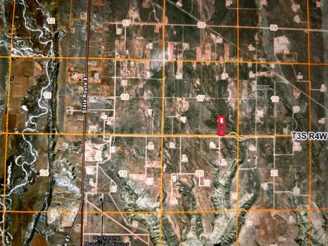 Property Survey Map. Indicating boundaries and identifying the property's location within a grid system