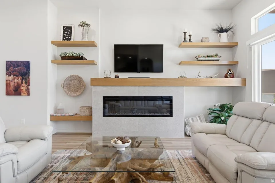 Contemporary fireplace with a linear insert and a light-colored tile surround