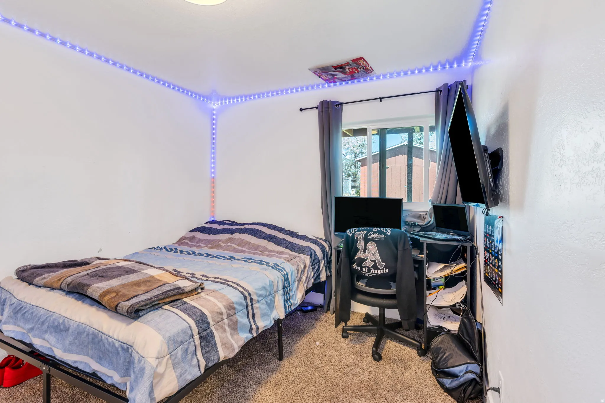 Bedroom featuring white walls and carpet flooring