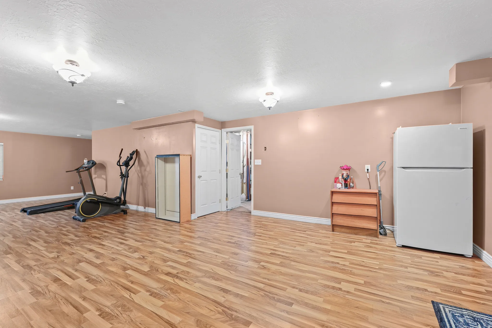 Enjoy a massive finished basement with room for movie nights, a game room, fitness equipment, a play area, and more.