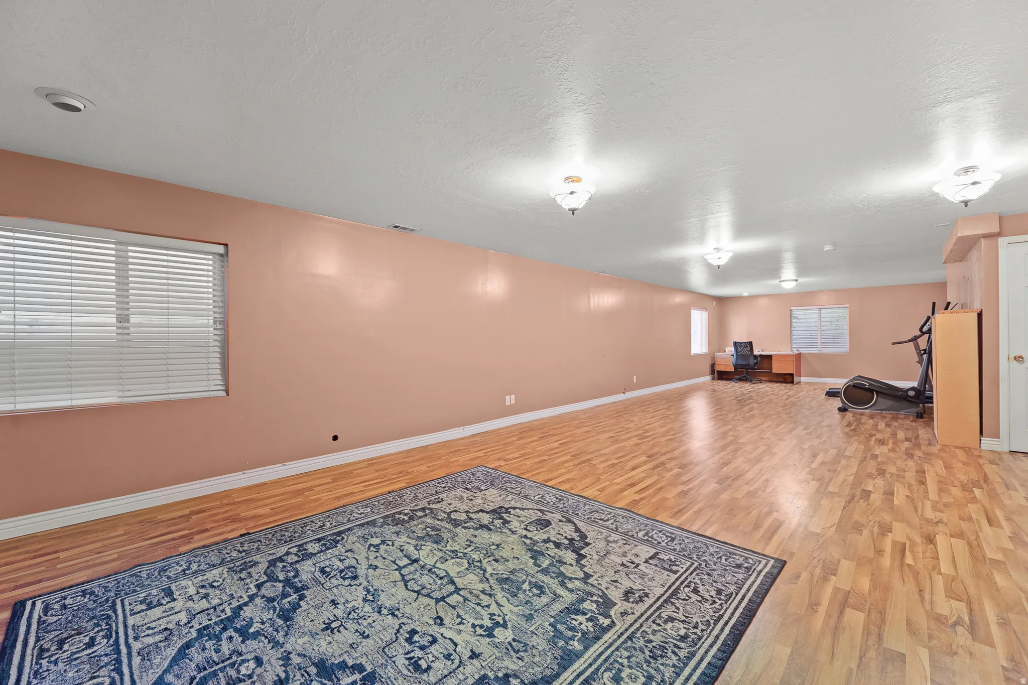Enjoy a massive finished basement with room for movie nights, a game room, fitness equipment, a play area, and more.