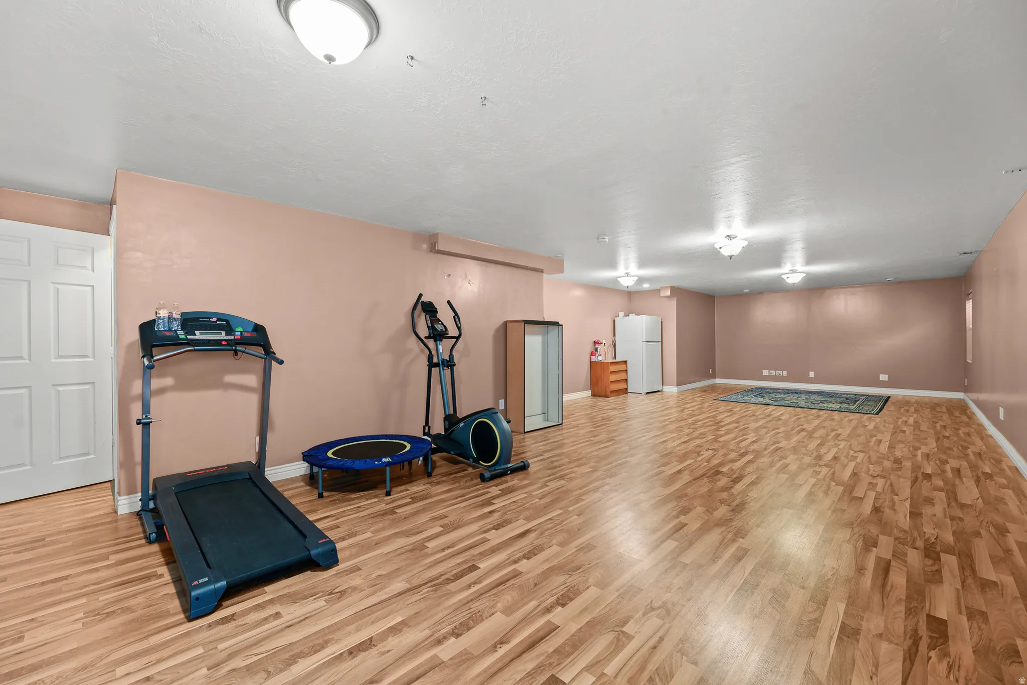 Enjoy a massive finished basement with room for movie nights, a game room, fitness equipment, a play area, and more.