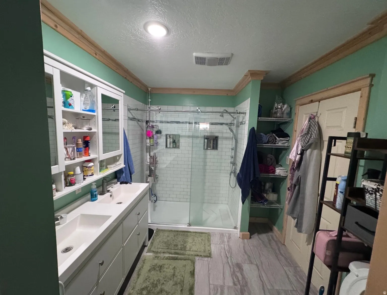 Dual-sink vanity with built-in storage and mirrored medicine cabinets