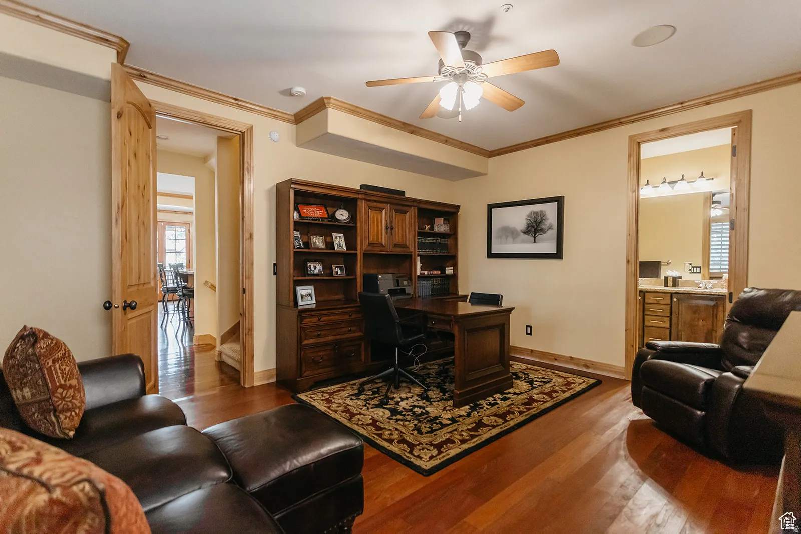 Hardwood-finish flooring throughout, featuring natural wood trim and solid wood doors
