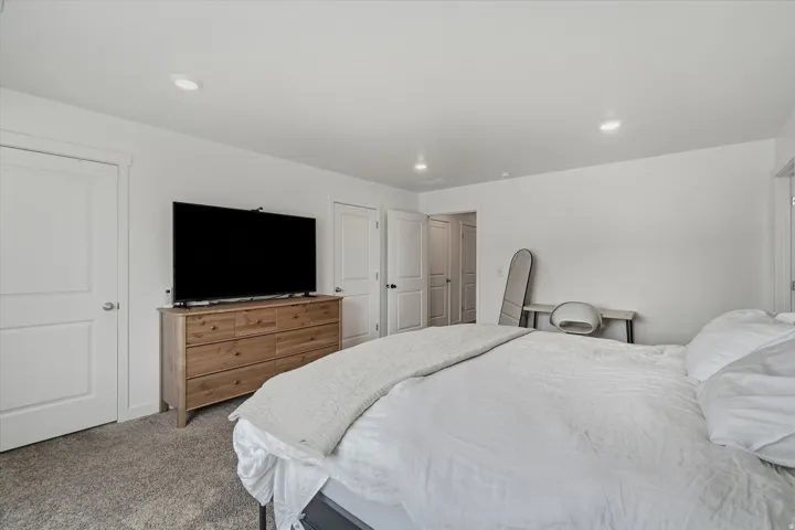 Bright interior space featuring light-toned walls and recessed lighting