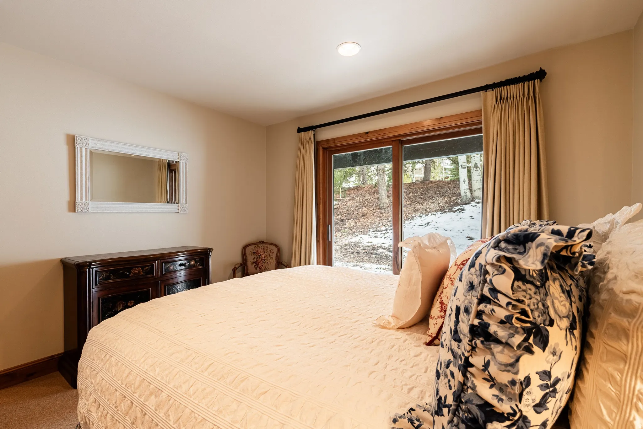 Bedroom featuring a glass sliding door, recessed lighting, and light-colored walls