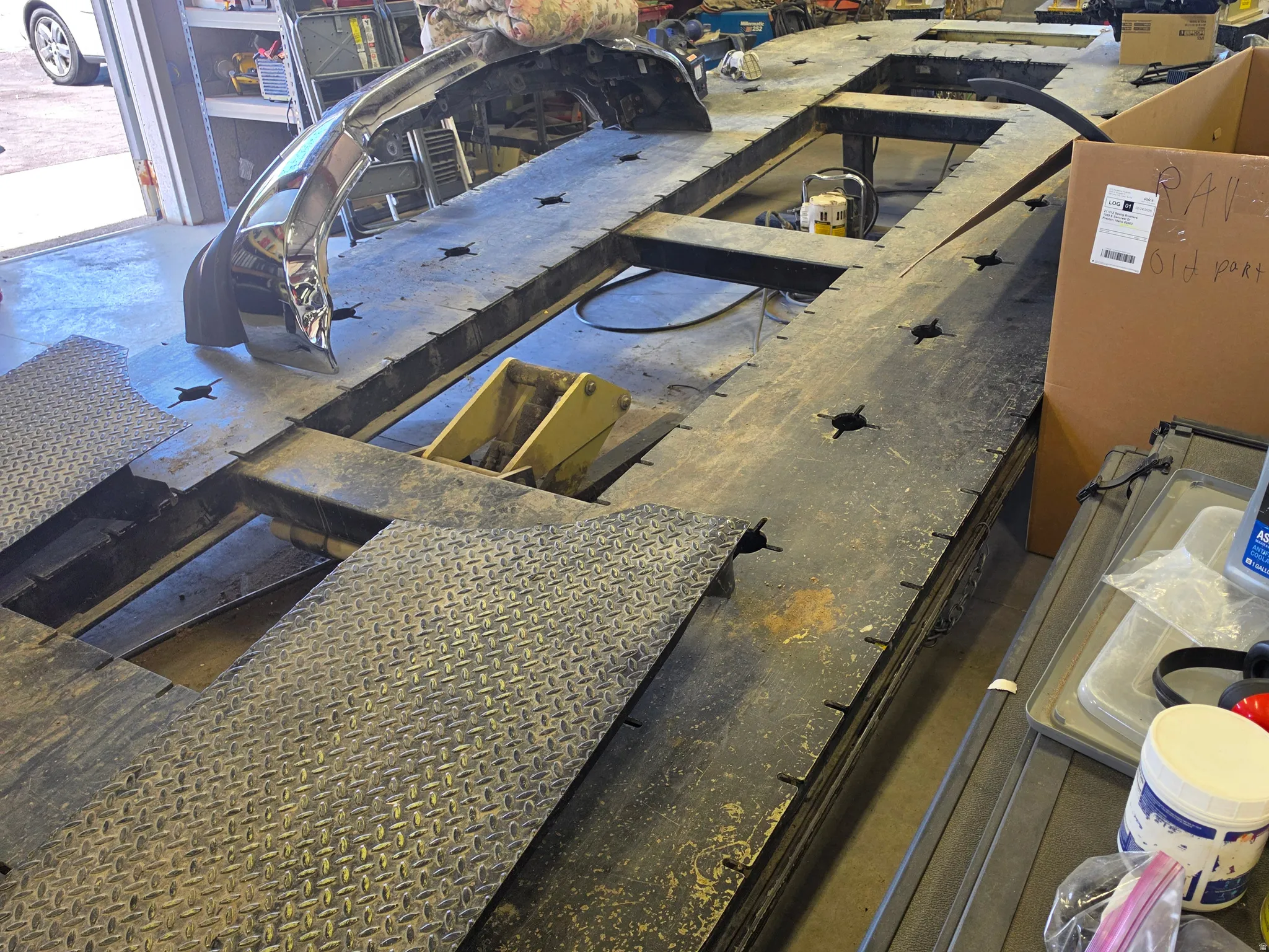 Industrial-grade diamond plate flooring with a robust metal frame structure