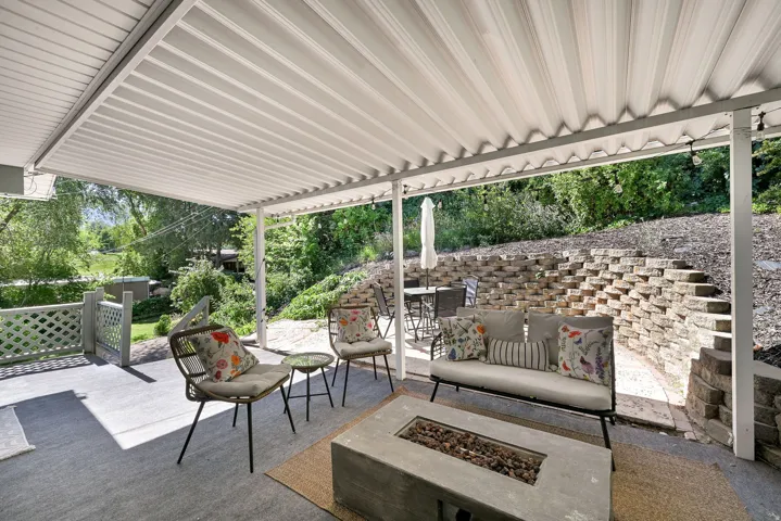 Covered patio featuring a corrugated white metal roof