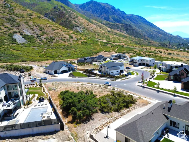 Terraced hillside residential setting with a paved cul-de-sac