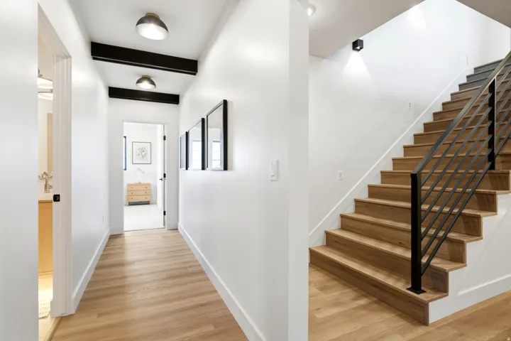 Contemporary interior featuring light wood-finish flooring throughout