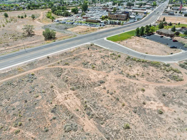Expansive undeveloped land with direct main road frontage