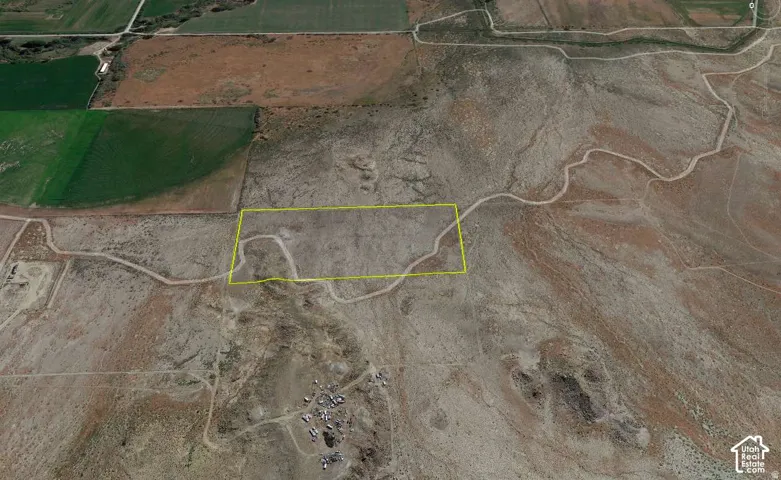 Aerial Map. Depicting the property's boundary and surrounding land features