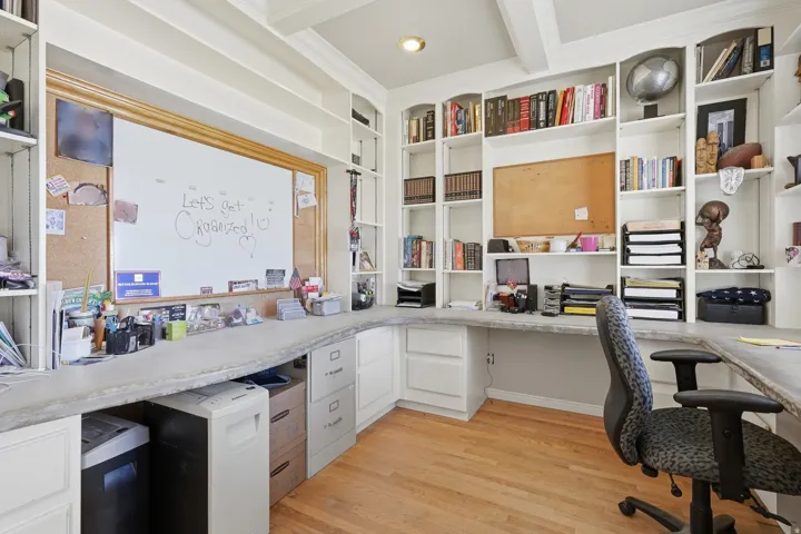 Custom built--in shelves, concrete countertops