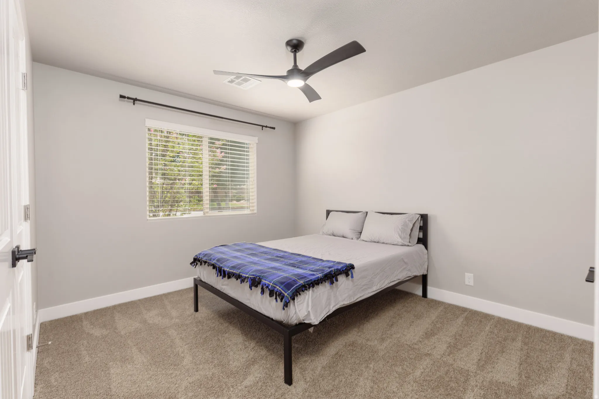 Guest bedroom 1, will fit a queen size bed and dresser