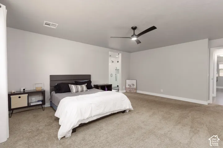 Large primary bedroom with custom ensuite bathroom