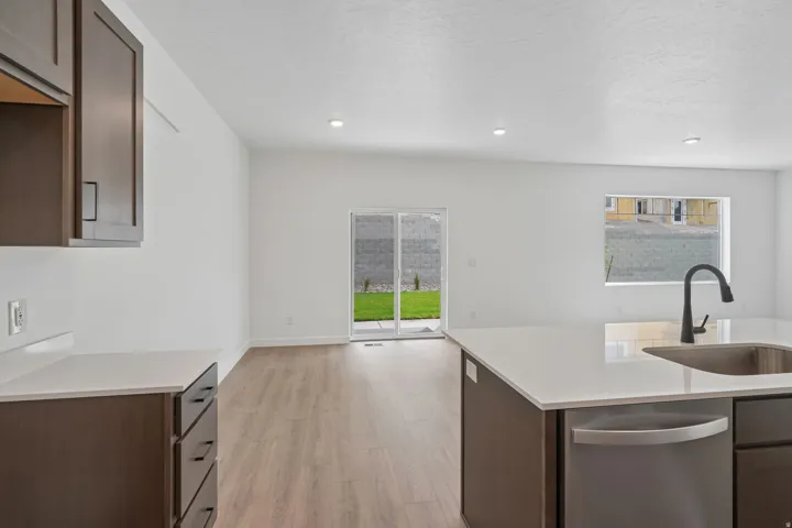 Wood-finish flooring throughout, with recessed lighting