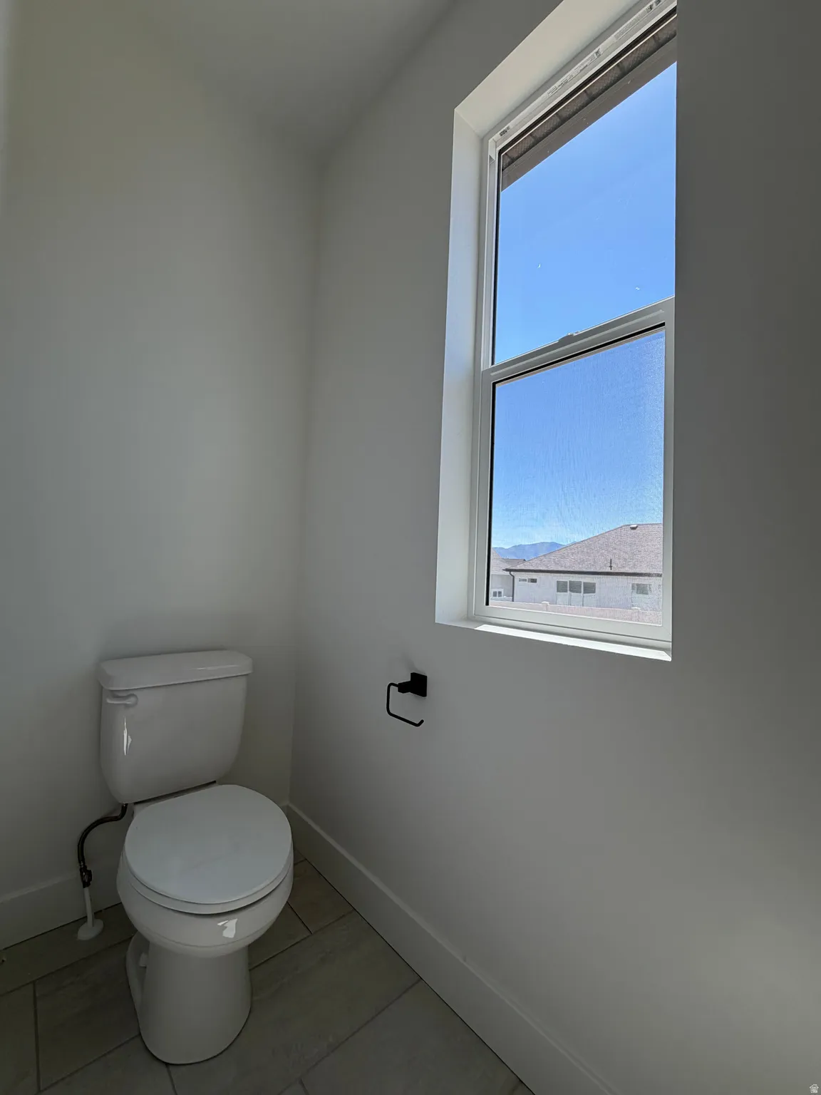 Private toilet closet in primary bathroom