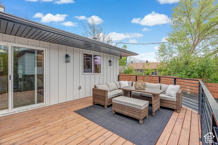 Expansive wood deck with a modern black railing system