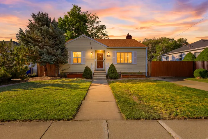 Charming 1941 Sunset Ave bungalow with inviting curb appeal, mature landscaping, welcome home!