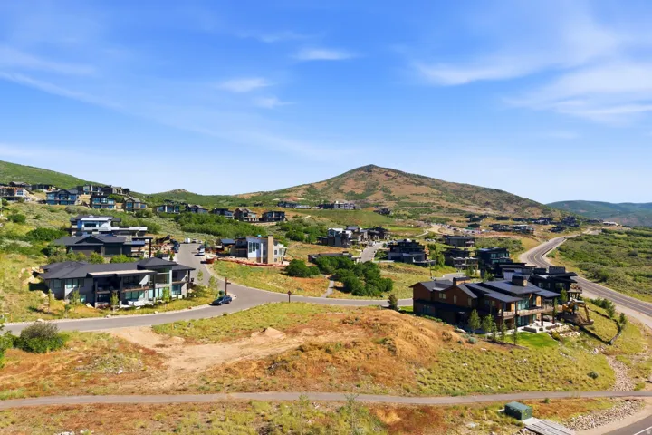 Expansive residential development nestled into a mountain landscape