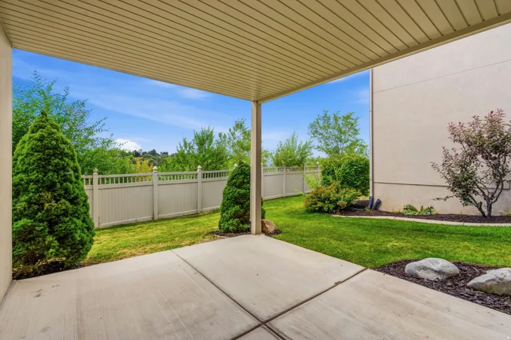 Covered patio featuring concrete slab flooring