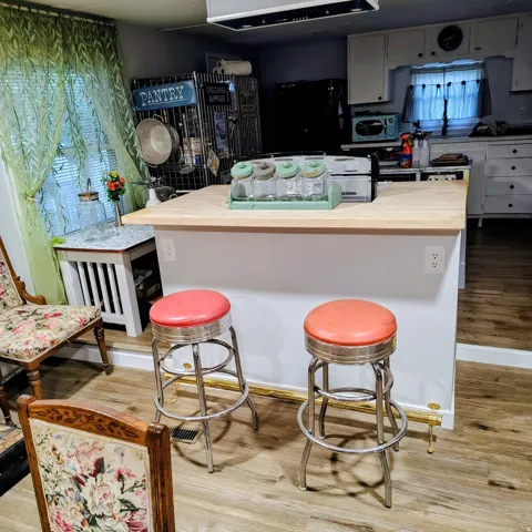 Kitchen island with wood-finish countertop