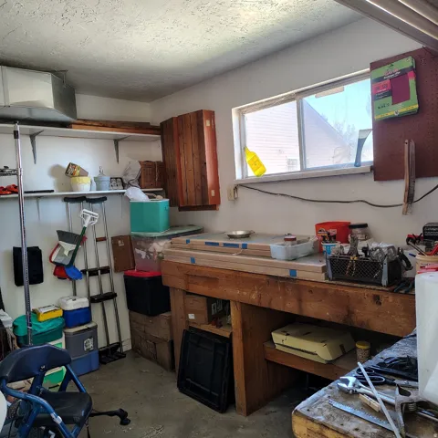 Work bench and cabinets in heated storage room