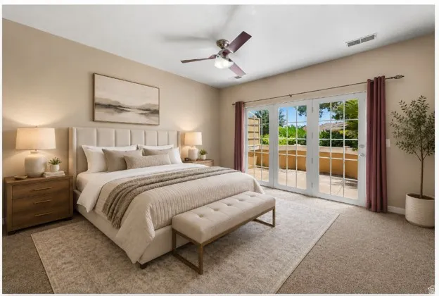 French doors opening to an outdoor patio with privacy wall, light neutral wall paint, ceiling fan with integrated lighting, and carpeted flooring