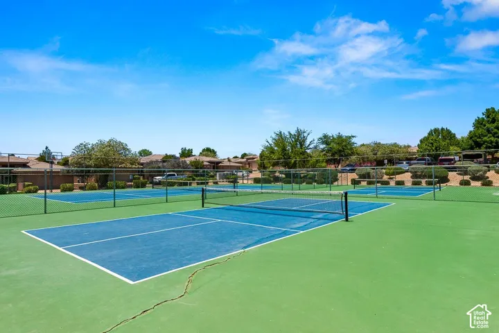 Outdoor recreational courts featuring blue and green surfacing