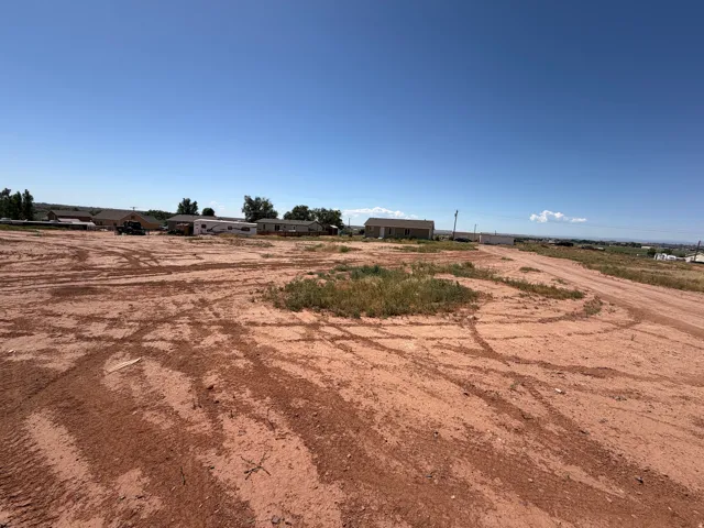 Expansive land parcel featuring a clear, open buildable area