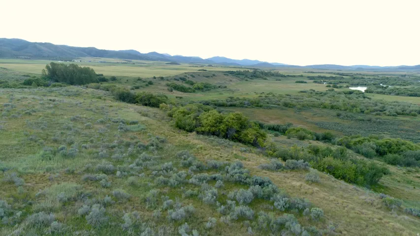 Expansive natural landscape with rolling hills