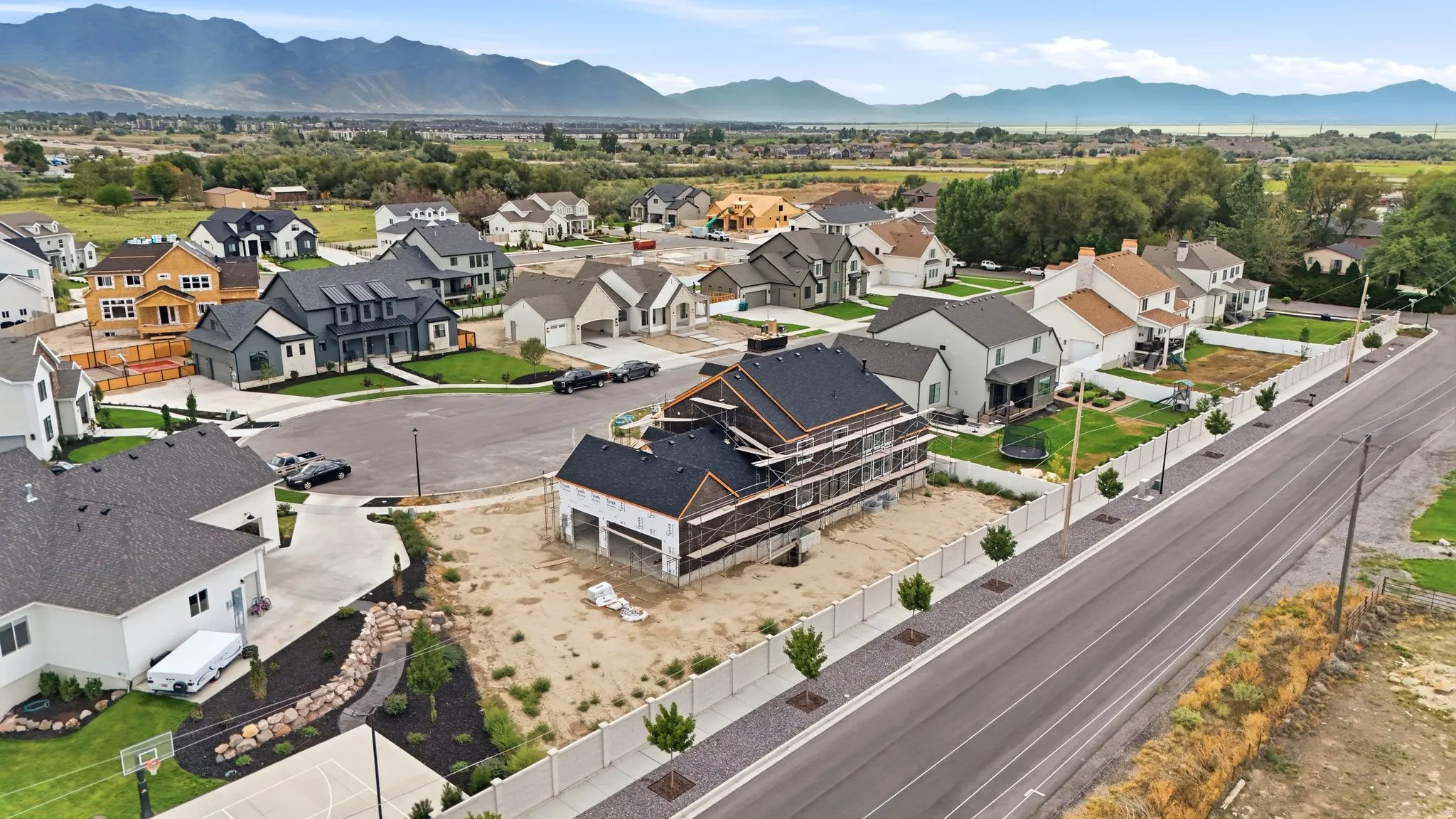 New construction home featuring a multi-level design and an attached two-car garage