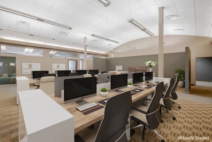 Open-plan office staged with wood-finish workstations, partial-height dividers, and suspended linear lighting