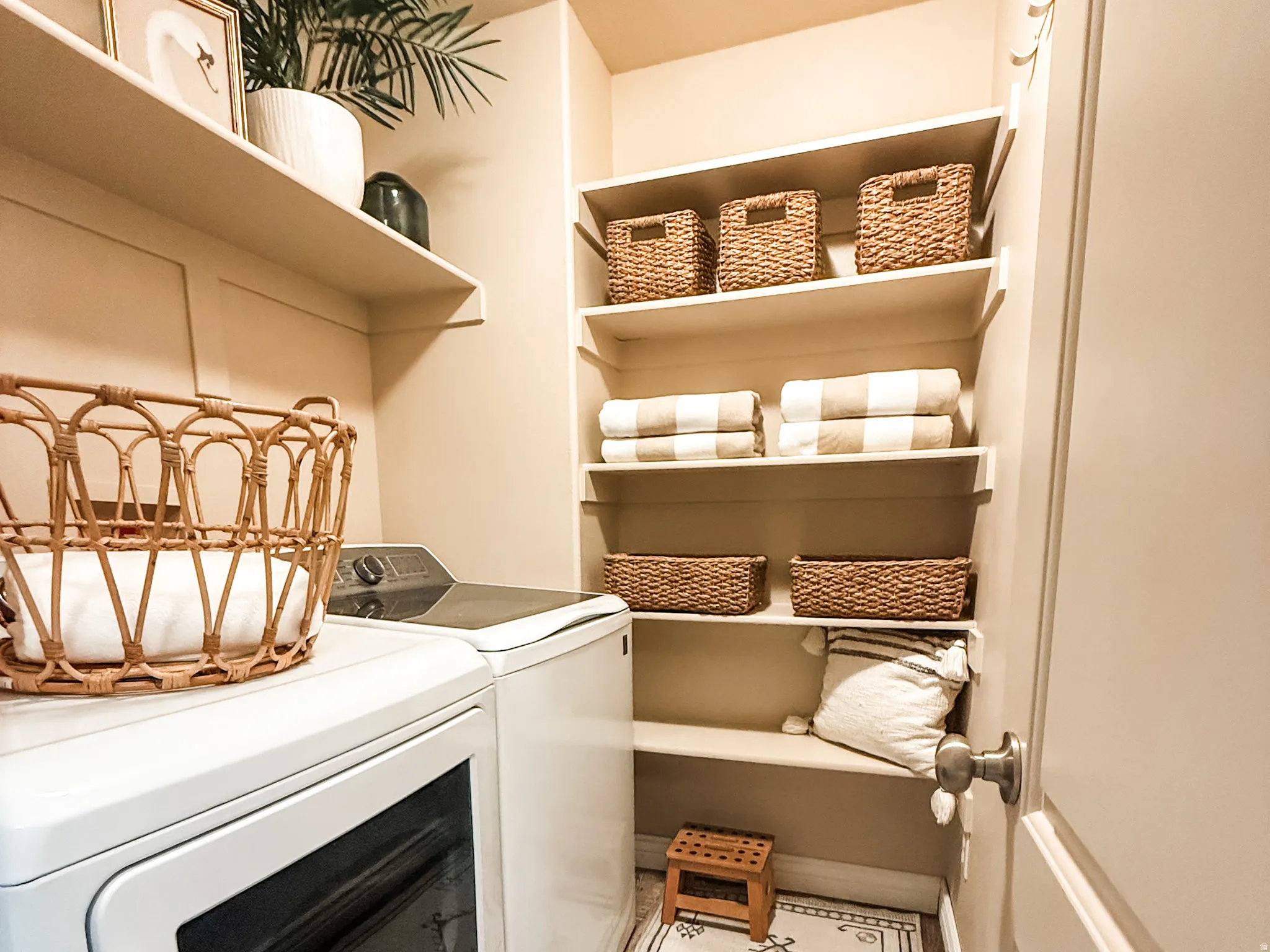 Dedicated laundry area featuring a washer and dryer