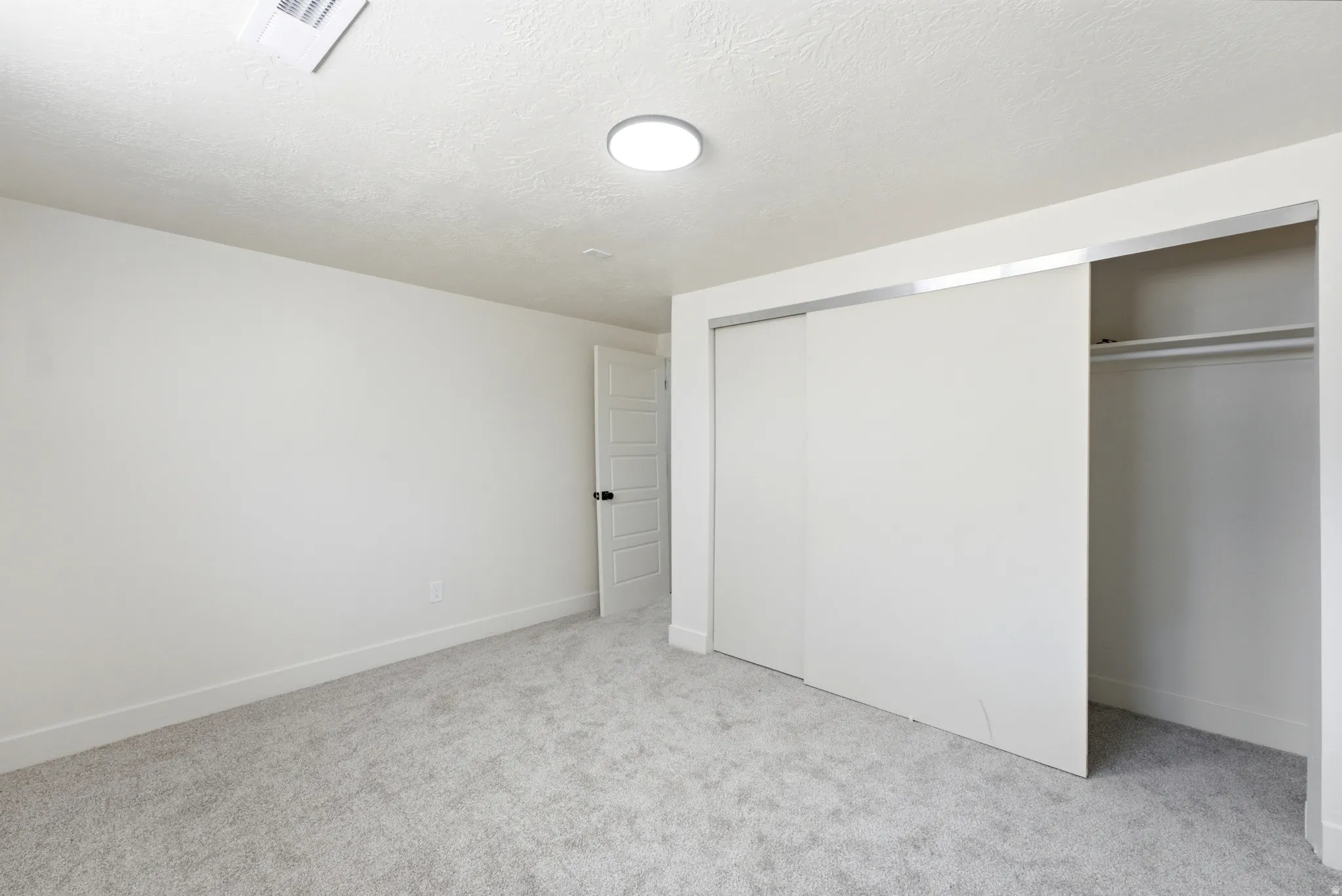Neutral tone walls with white trim
