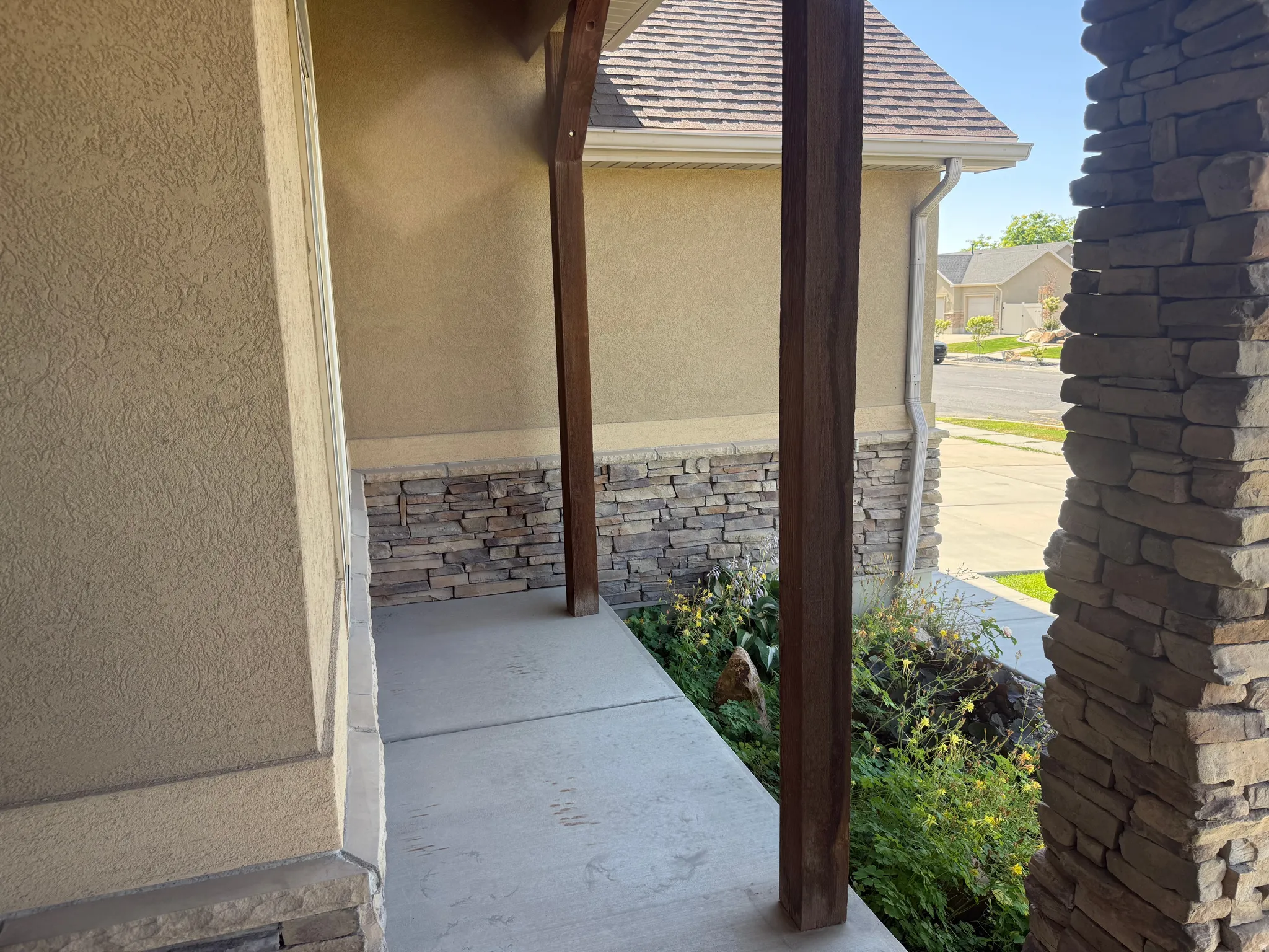Covered porch with concrete flooring