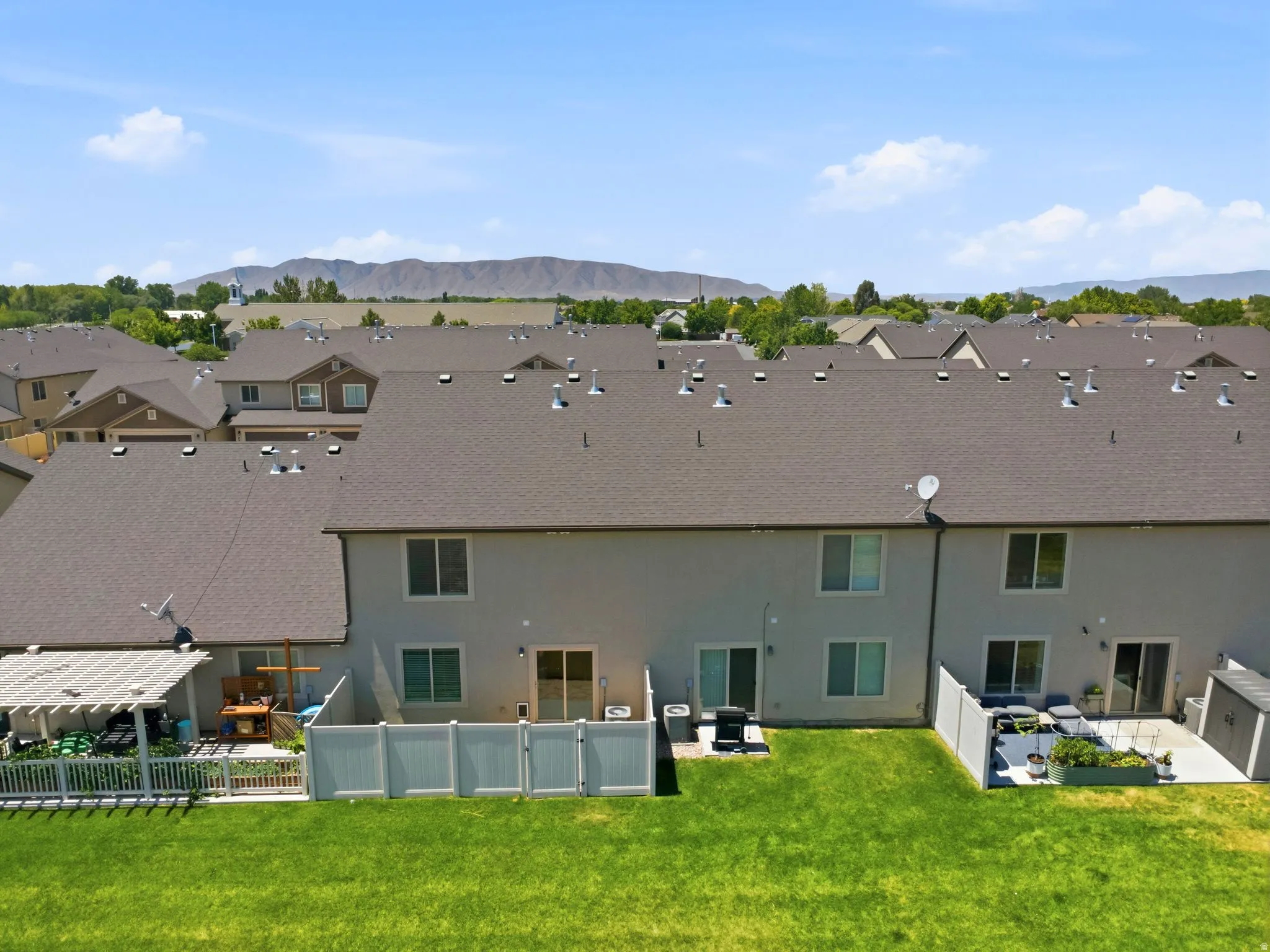 Expansive rear property with manicured lawn