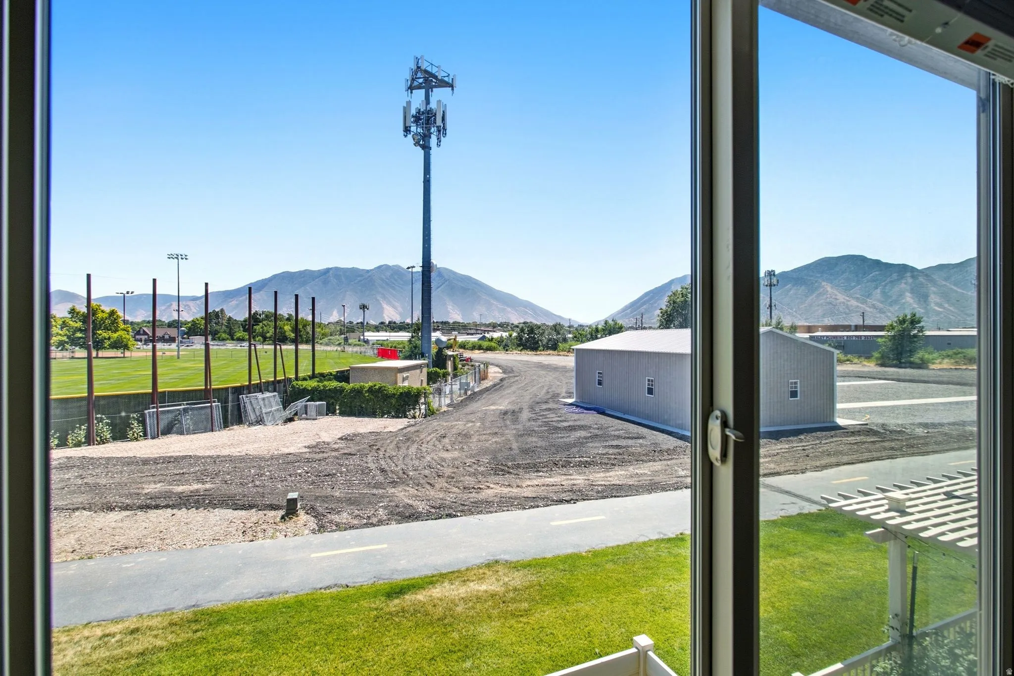 Expansive exterior views featuring distant mountains and open fields