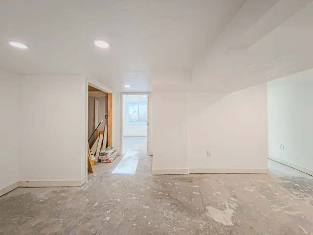 Recessed ceiling lighting with white trim, walk in closet and new carpet on the way!