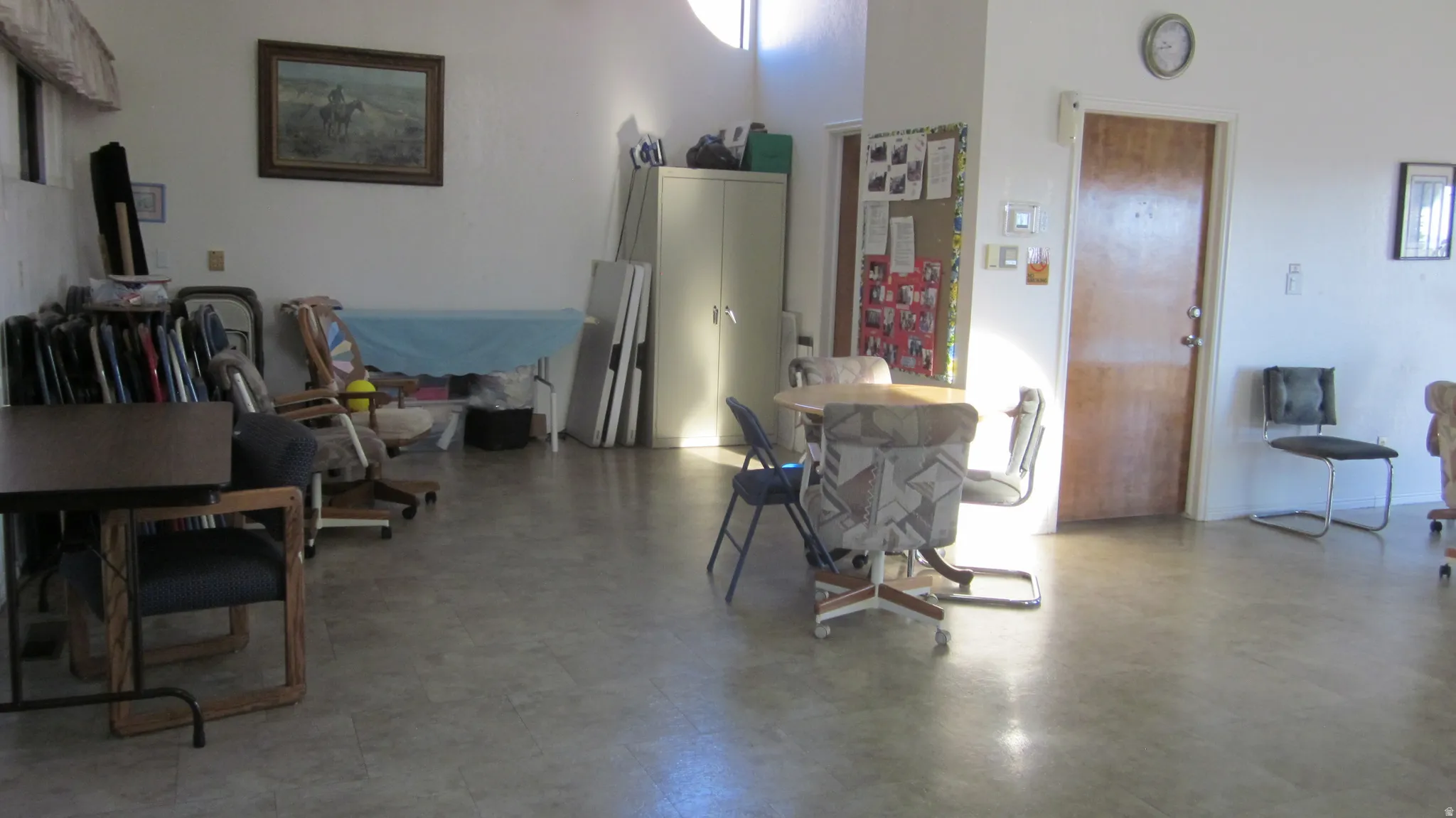 Spacious interior with smooth concrete flooring and high ceilings