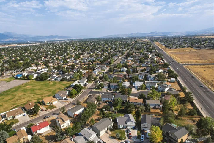 Expansive aerial perspective showcasing a residential development with varied housing styles